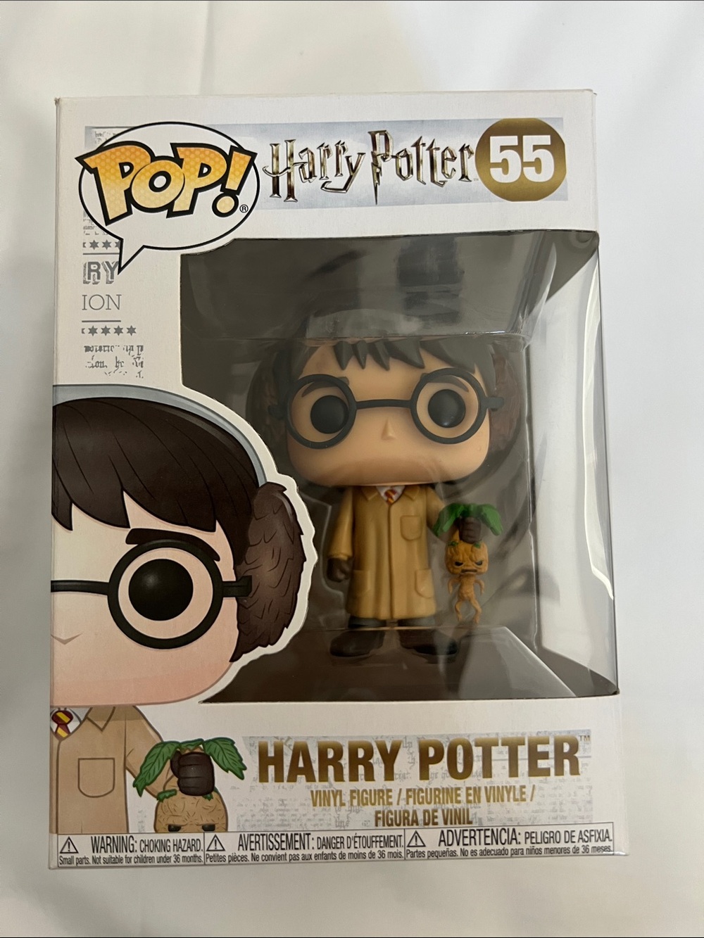 pop Harry Potter Vinyl Figure with Tan Coat and Green Mandrake